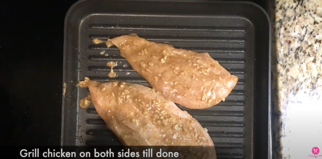 cooking the chicken fillet on the grill pan