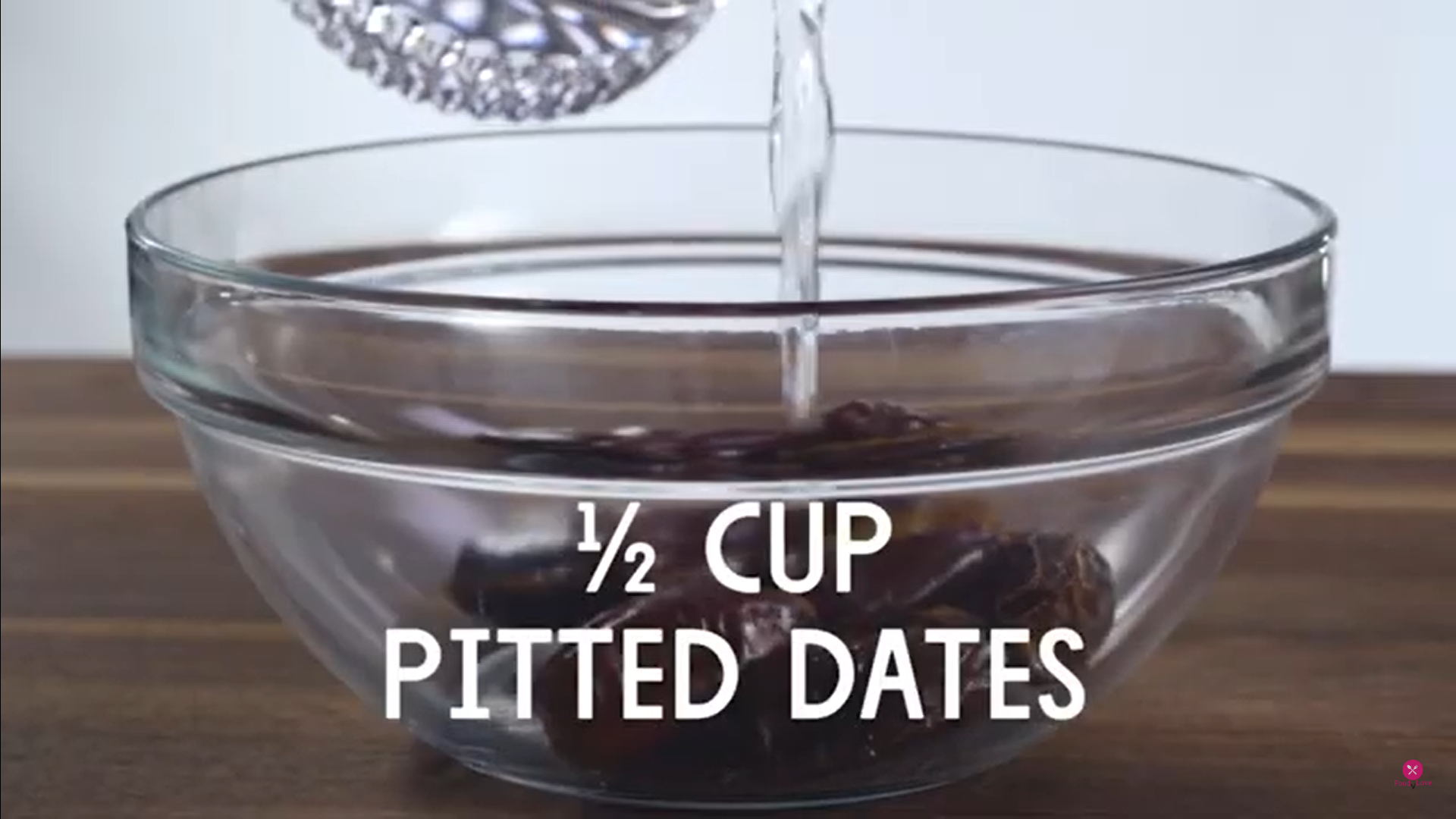 putting water in a bowl with dates