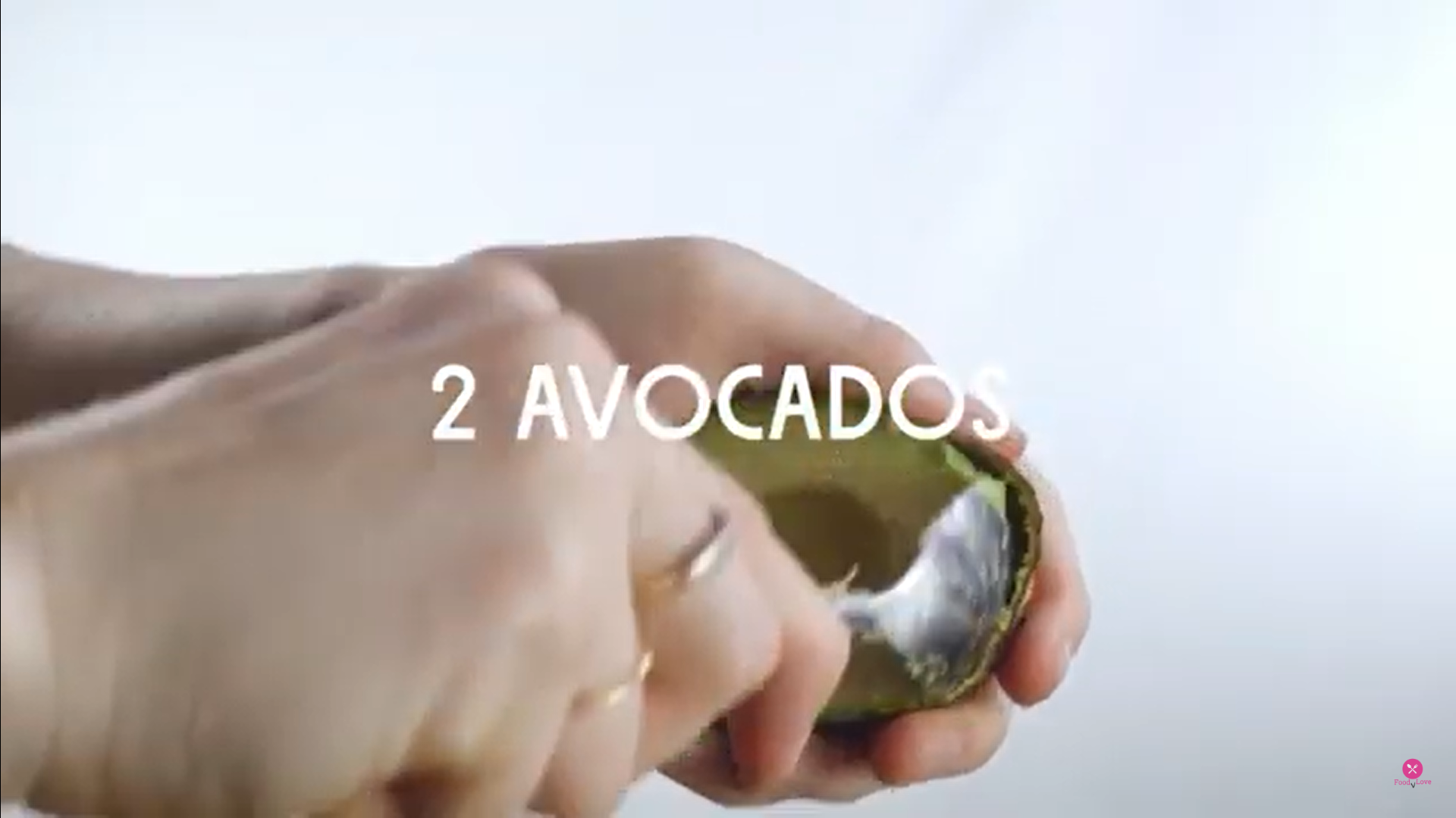 taking out avocado with the help of a spoon