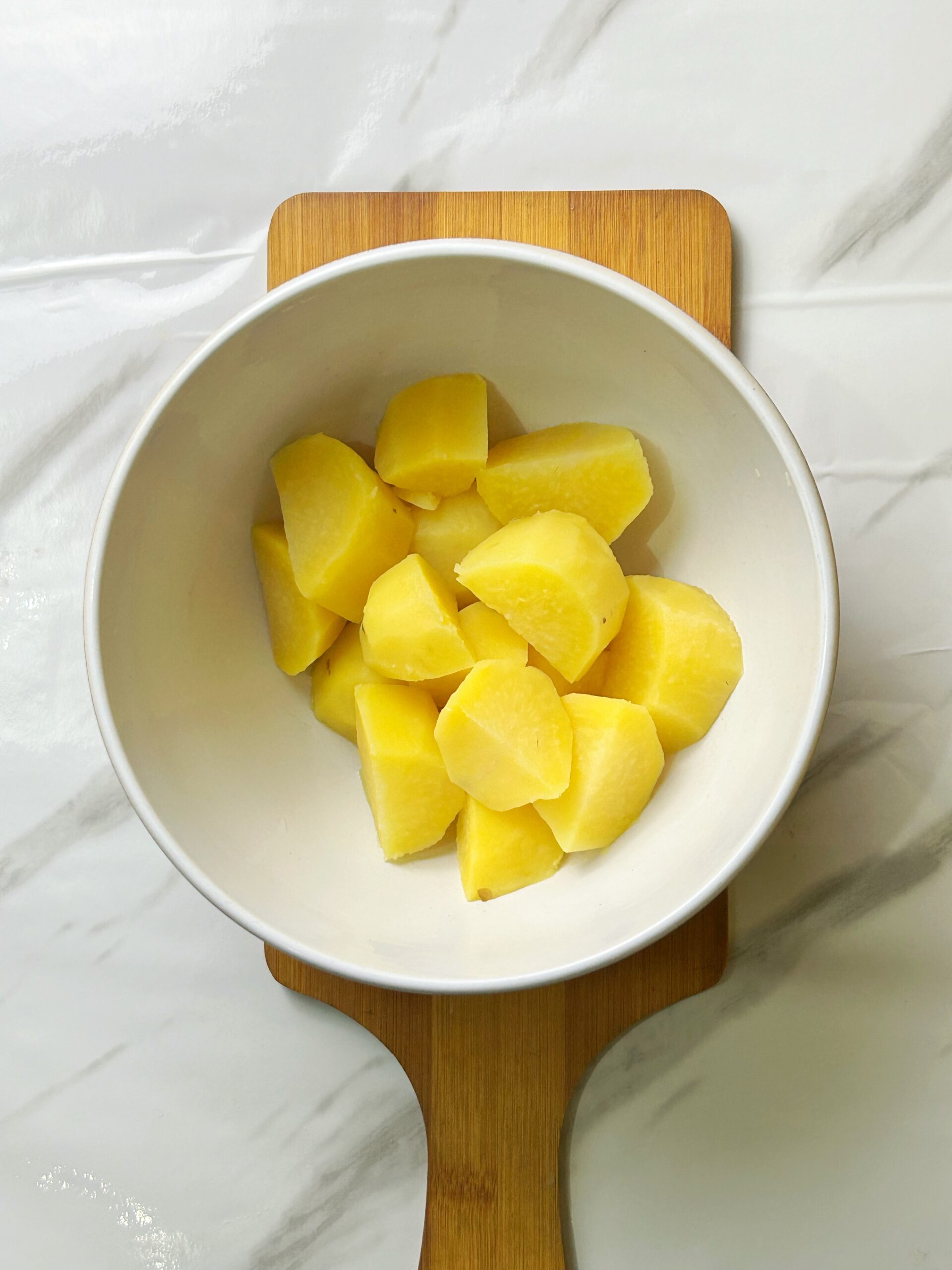 boiled and peeled potatoes