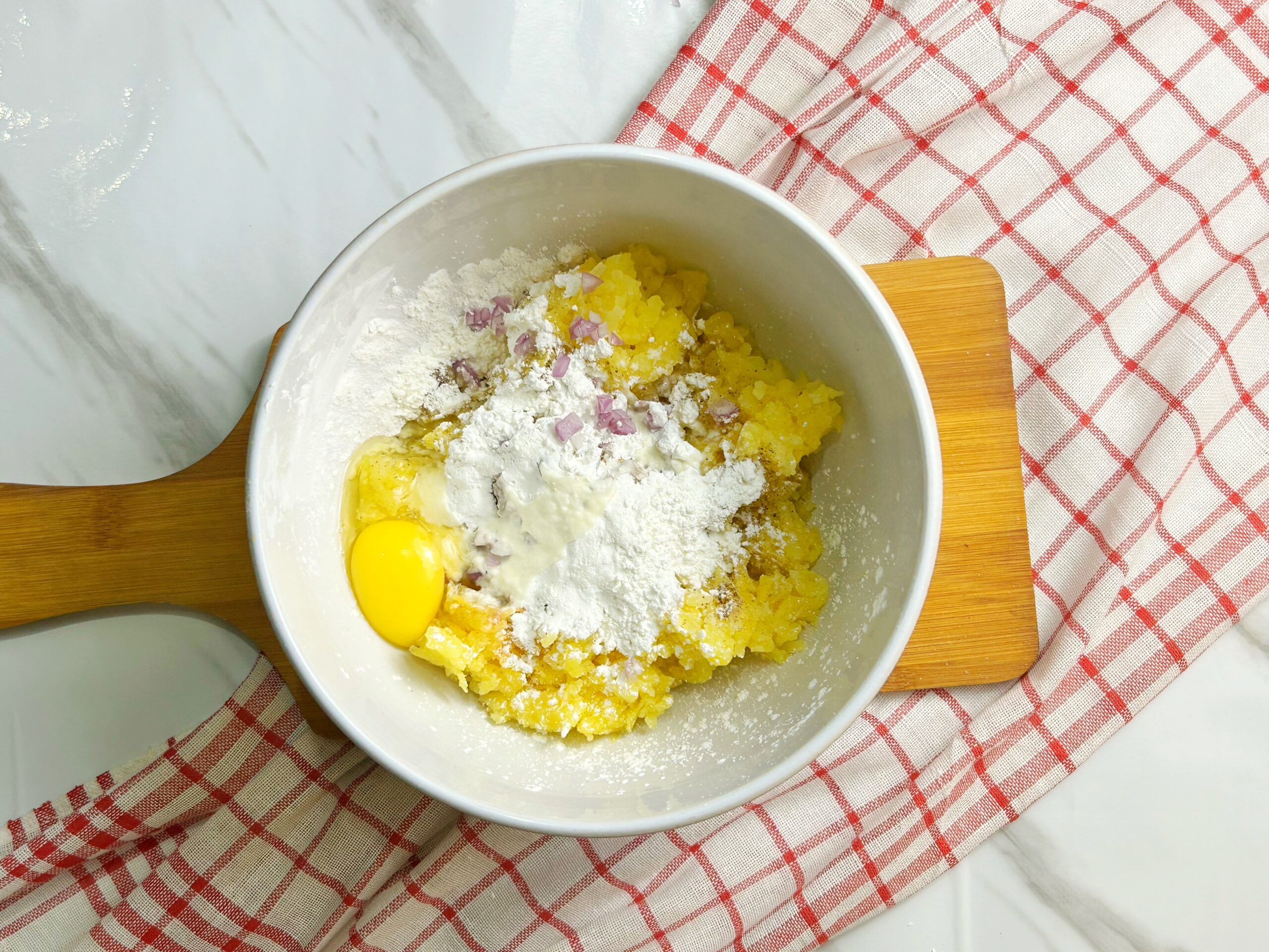 combining all the ingredients in a bowl