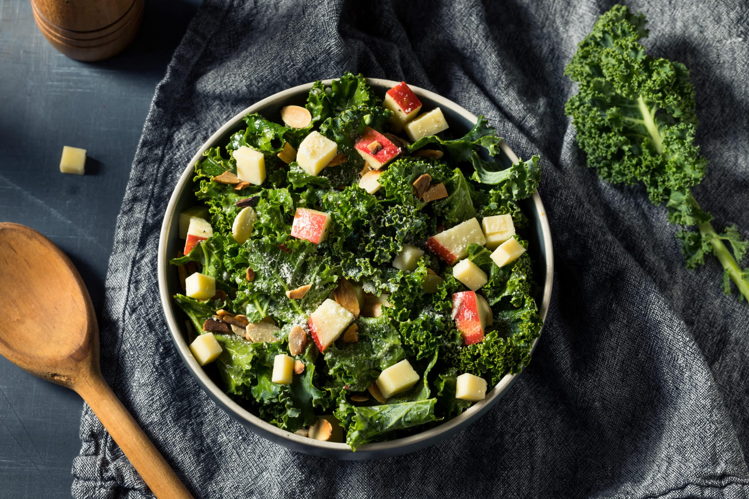 Homemade Healthy Kale waldorf salad with apple and Nuts